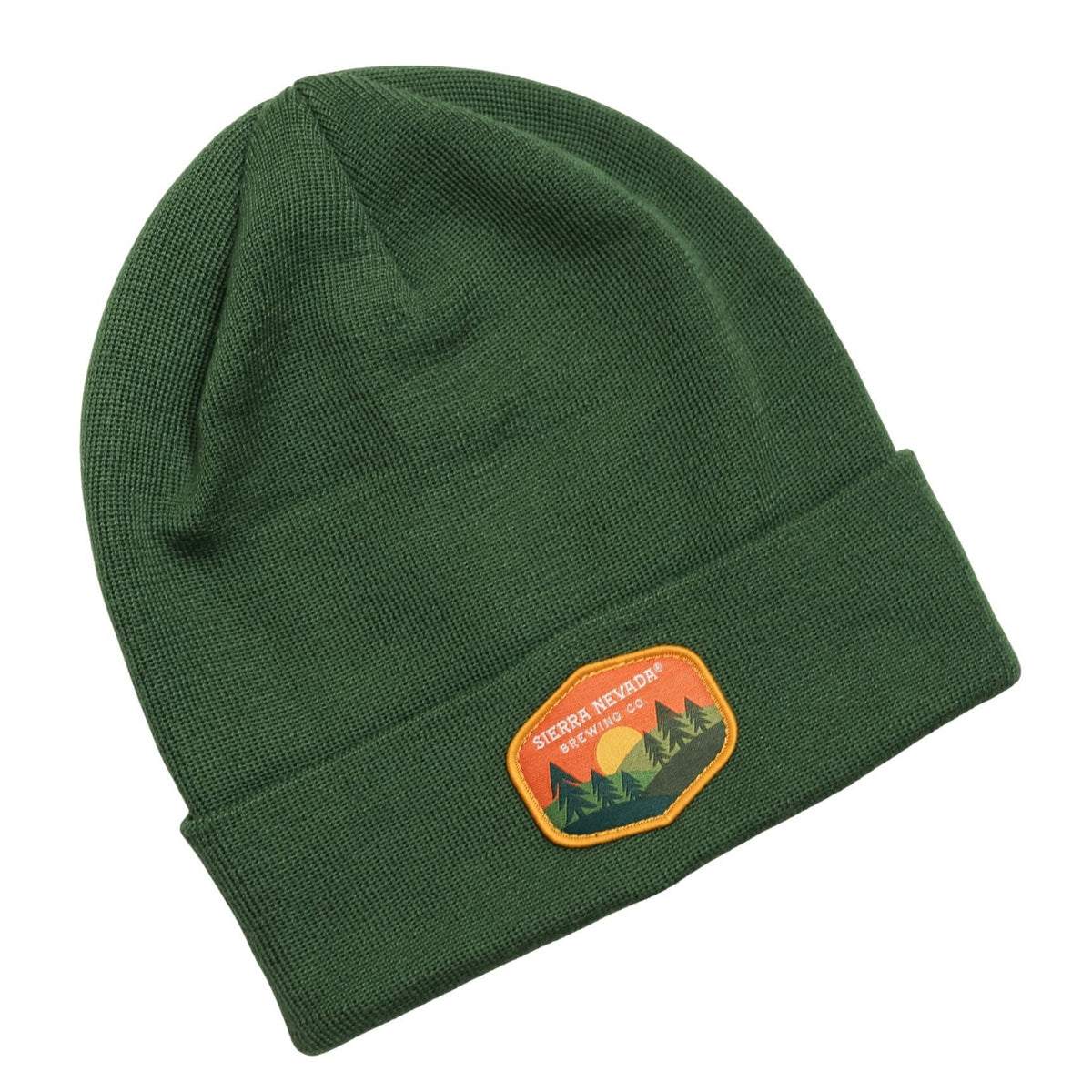 Green beanie with a patch on a white background