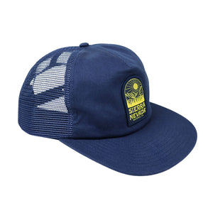 Thumbnail of Blue mesh cap with a yellow logo on a white background