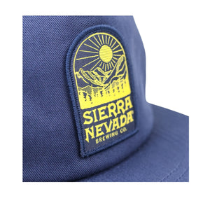 Thumbnail of Blue cap with a yellow Sierra Nevada Brewing Co. patch on a white background