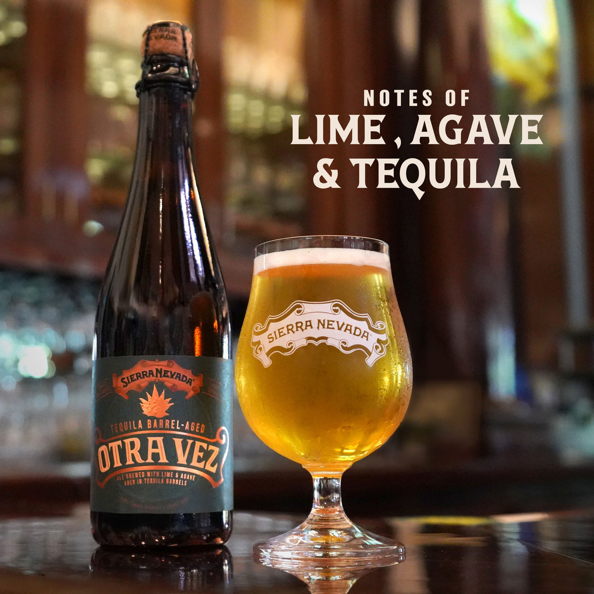 A bottle of Sierra Nevada Otra Vez tequila barrel-aged next to a glass of golden beer with foam, set on a bar counter with the text 'NOTES OF LIME, AGAVE & TEQUILA' in the upper right.