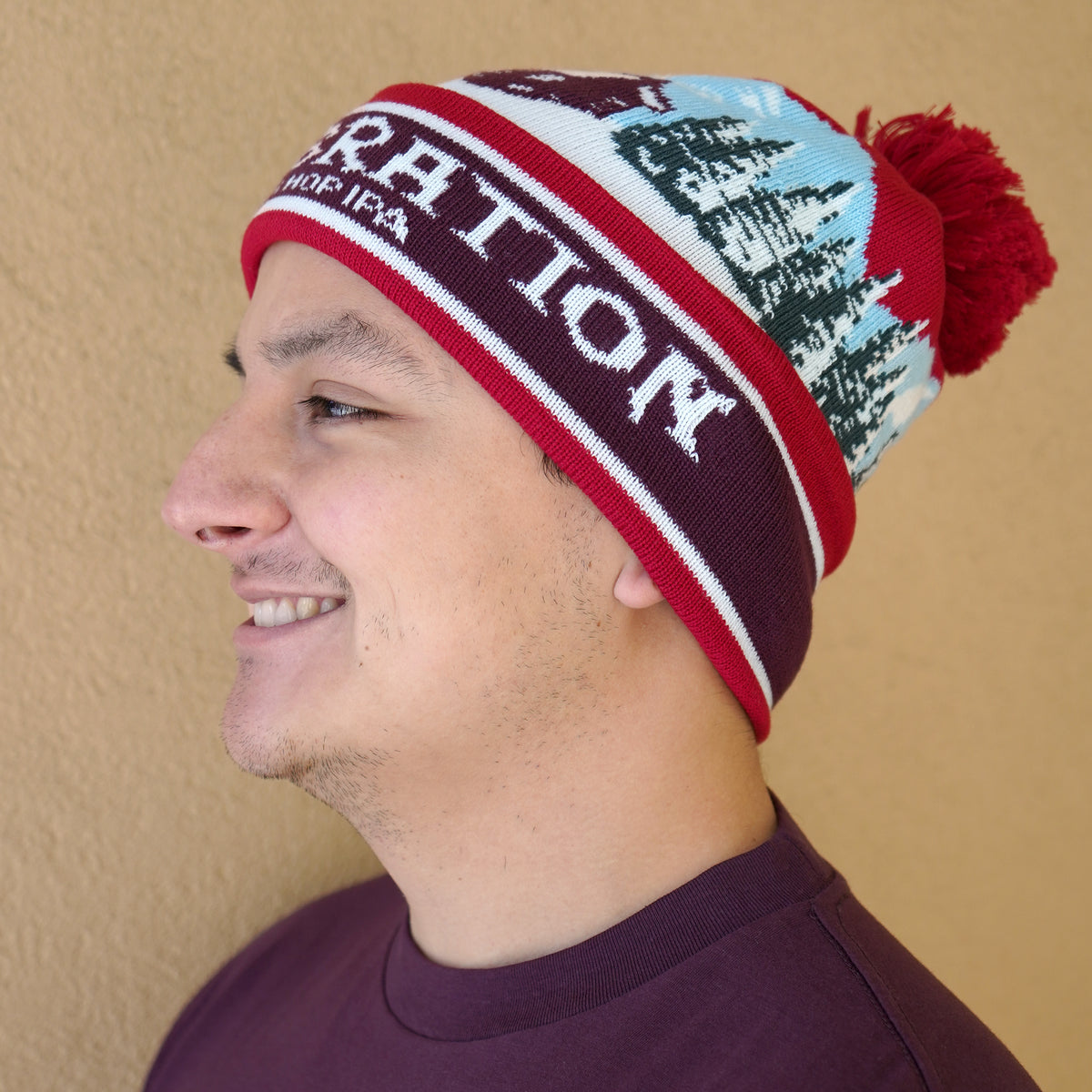 Side angle view of the Sierra Nevada Celebration Beanie worn by a man