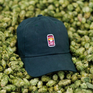Thumbnail of Green cap with a Celebration can logo on a bed of green hops