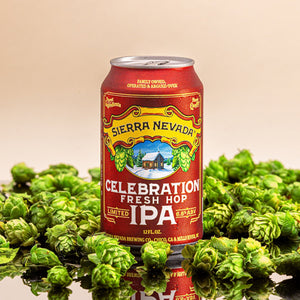 Thumbnail of Sierra Nevada Celebration Fresh Hop IPA can surrounded by green hops on a reflective surface.