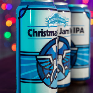 Thumbnail of Three Sierra Nevada beer cans with colorful blurred lights in the background