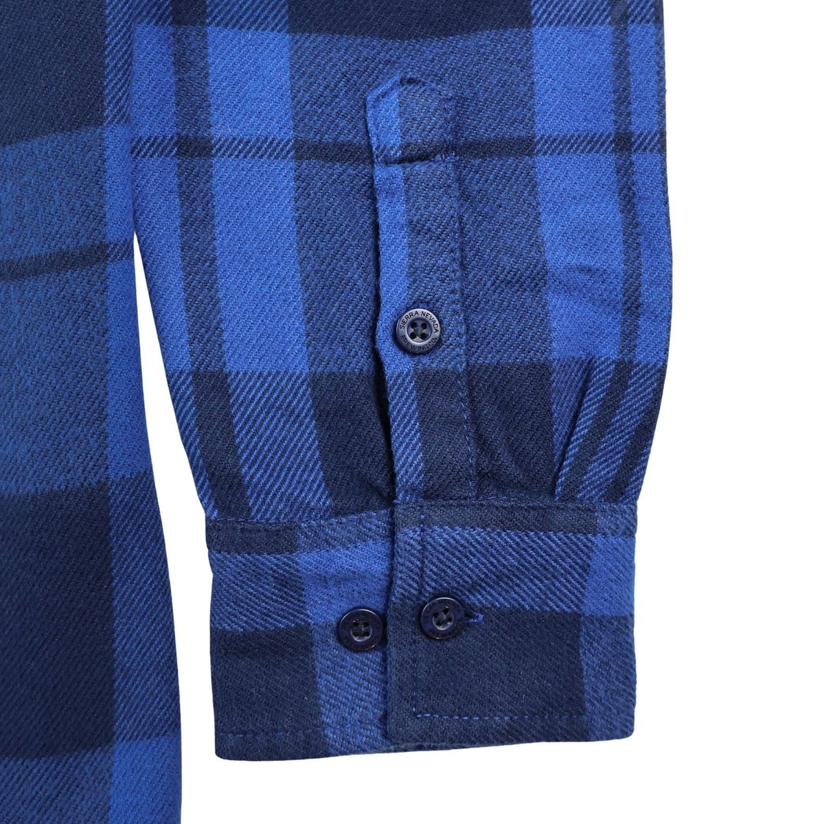 Blue plaid shirt with buttons on a white background