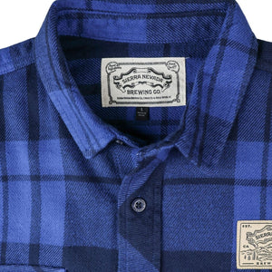 Thumbnail of Blue plaid shirt with brand labels on a white background
