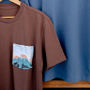 Thumbnail of Two t-shirts with Great Smoky Mountains National Park designs on a wooden background