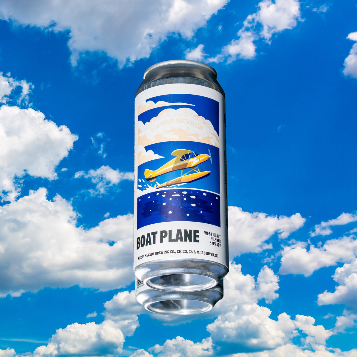Can of Boat Plane against a blue sky with clouds
