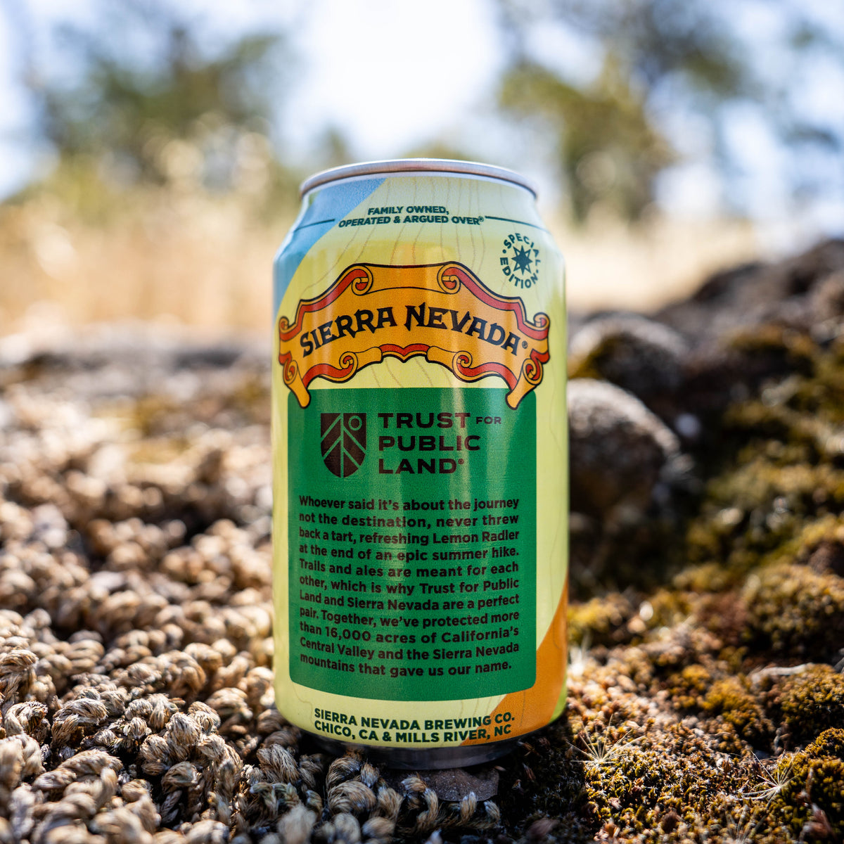 Sierra Nevada beer can on a rocky surface with a natural background