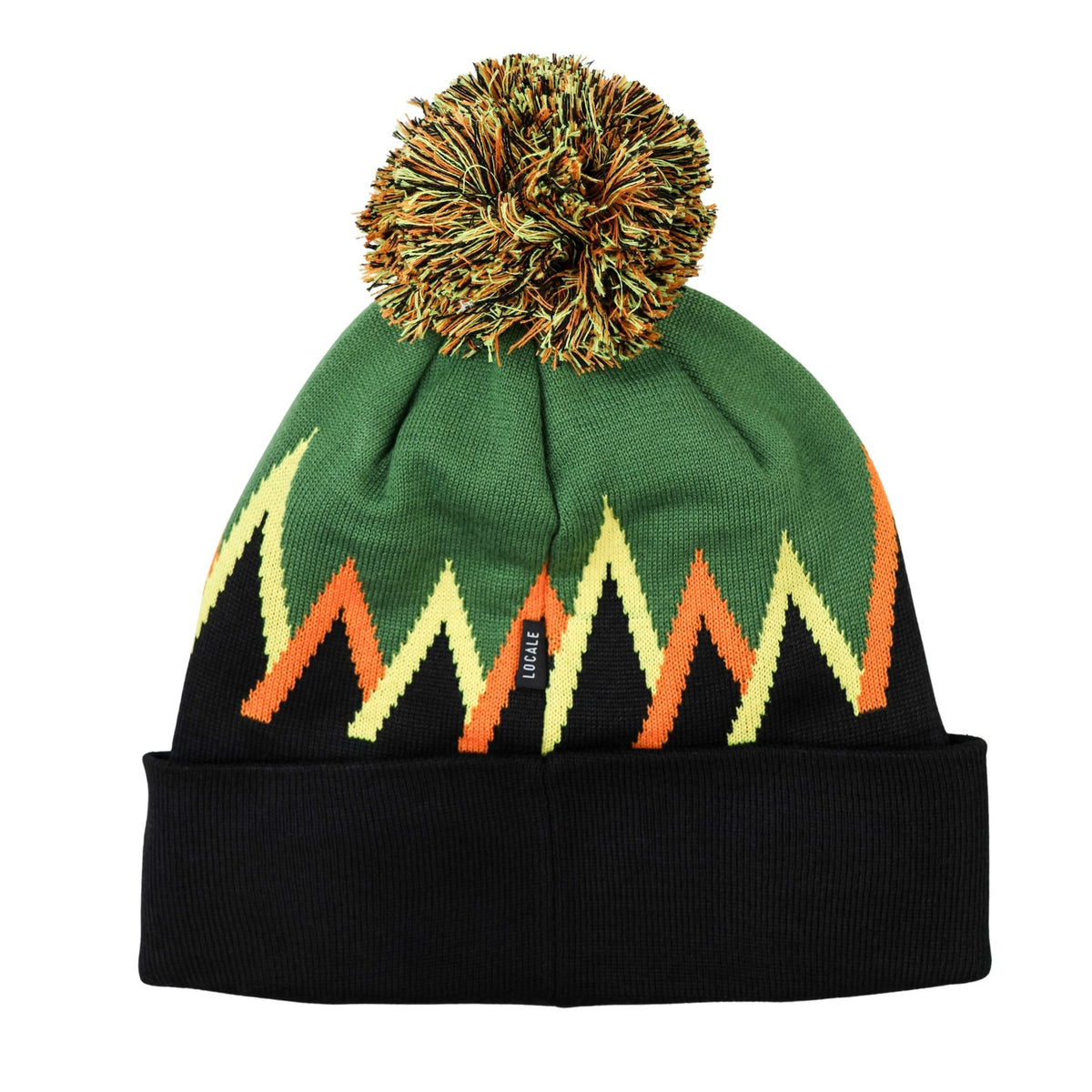 Green knit beanie with orange and yellow pattern and pom-pom on a white background