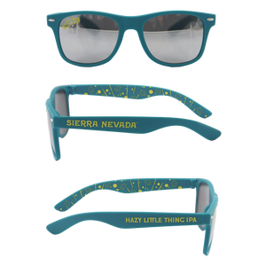 Thumbnail of Three views of teal sunglasses with gray mirrored lenses, featuring yellow text and graphics. The top view shows the front frame, the middle view shows the left temple with 'SIERRA NEVADA' in yellow, and the bottom view shows the right temple with 'HAZY LITTLE THING IPA' in yellow.