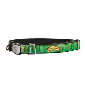 Thumbnail of A green dog collar featuring a forest pattern, a brass buckle, and a silver-toned keeper with the brand name 'Sierra Nevada' on a gold label.