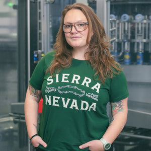 Thumbnail of Person wearing a green 'Sierra Nevada' t-shirt in an industrial setting