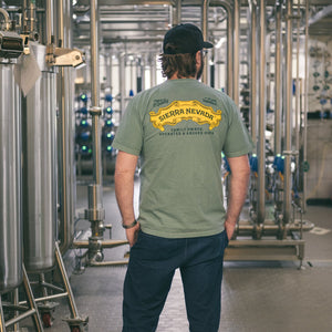 Thumbnail of Person wearing a green t-shirt with Sierra Nevada logo in a brewery setting