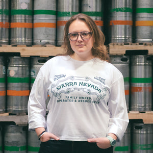 Thumbnail of Person wearing a Sierra Nevada shirt standing in front of beer kegs