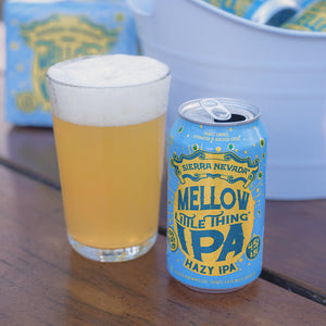 Thumbnail of A freshly poured pint glass full of Sierra Nevada Mellow Little Thing with the can sitting next to it