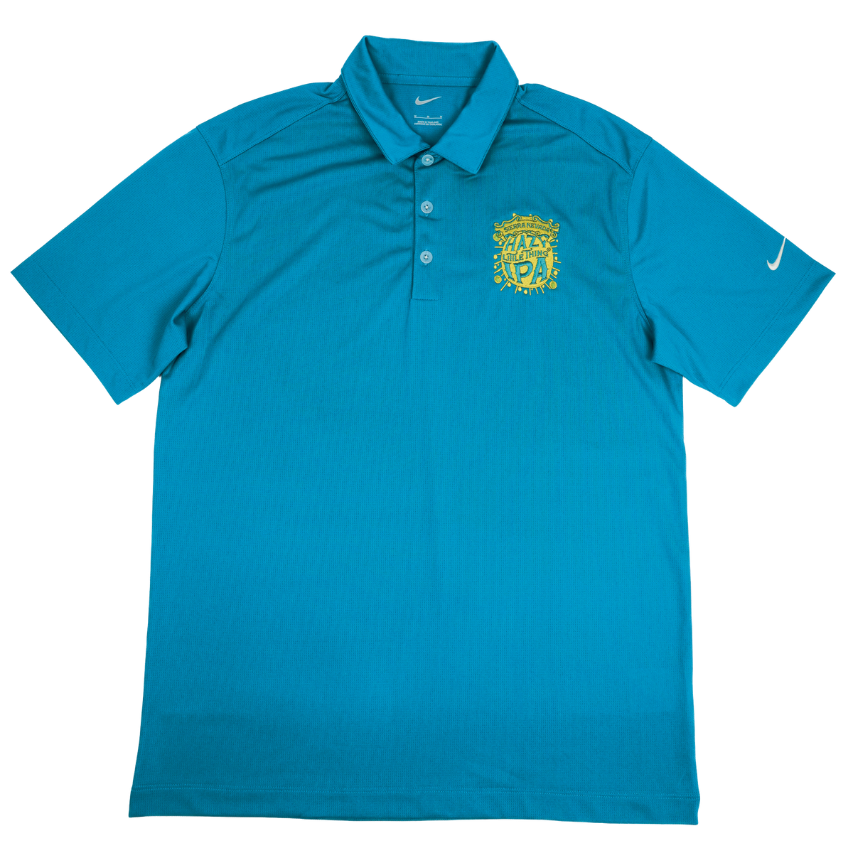 A teal blue Nike polo shirt with a yellow crest on the left chest and a white Nike swoosh on the right sleeve, displayed flat against a white background.
