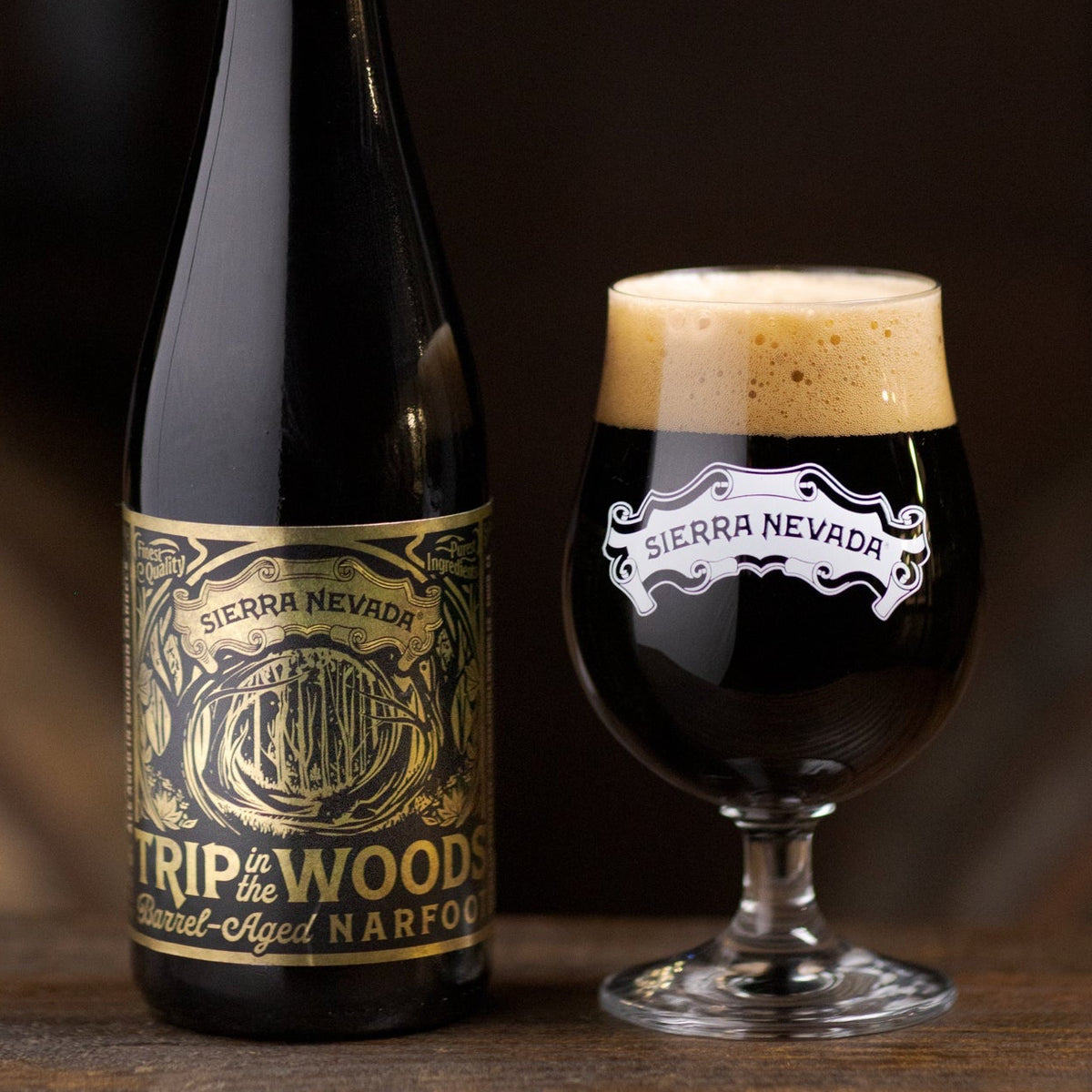 Sierra Nevada Trip in the Woods beer bottle and glass on a dark background