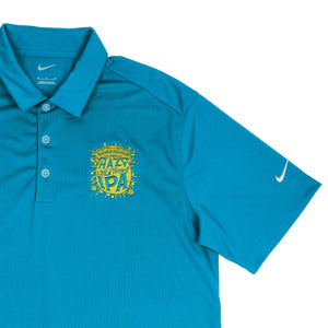 Thumbnail of Blue polo shirt with yellow text and Nike logo on a white background