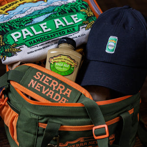 Thumbnail of Sierra Nevada Pale Ale bottle, cap, and cooler on a wooden surface