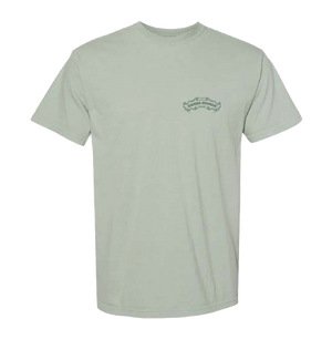 Thumbnail of A light sage green crewneck t-shirt with a small dark green graphic on the left chest, displayed on a solid white background.