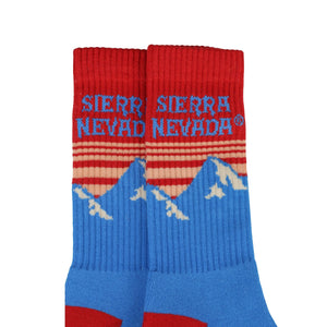 Thumbnail of Red and blue socks with 'Sierra Nevada' branding on a white background