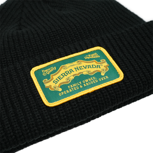 Thumbnail of Black knit beanie with Sierra Nevada logo patch on a white background