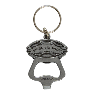 Thumbnail of A silver metal bottle opener keychain engraved with 'SIERRA NEVADA' on the top and 'Chico, CA' on the bottom, attached to a split key ring against a plain white background.
