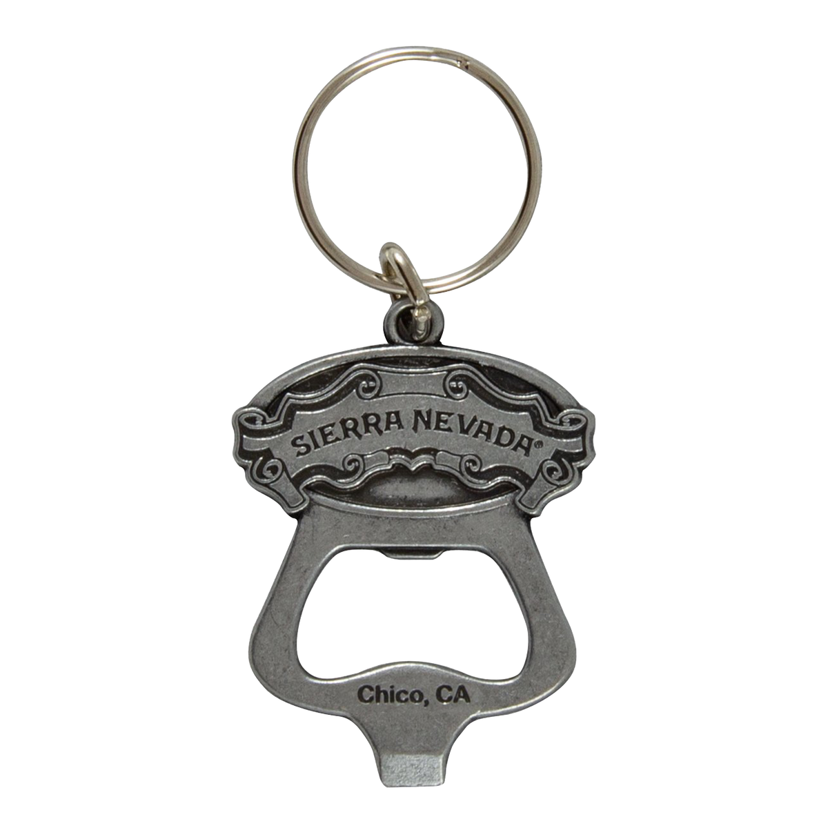A silver metal bottle opener keychain engraved with 'SIERRA NEVADA' on the top and 'Chico, CA' on the bottom, attached to a split key ring against a plain white background.