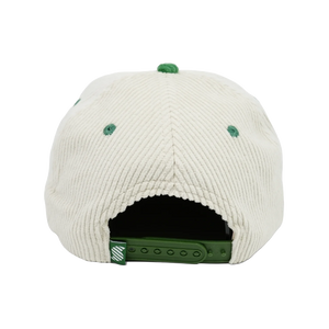 Thumbnail of The back view of a white corduroy snapback cap with green accents on the button, eyelets, and adjustable strap.