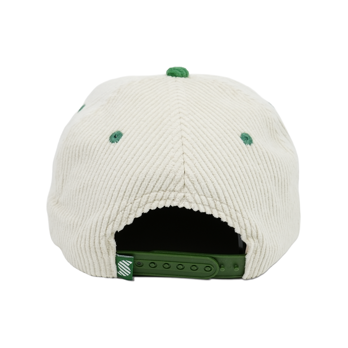 White corduroy cap with green buttons on a white background