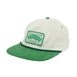 Thumbnail of A corduroy baseball cap in off-white and green, featuring a green patch on the front with the brand name 'Sierra Nevada' and a green rope detail around the brim.