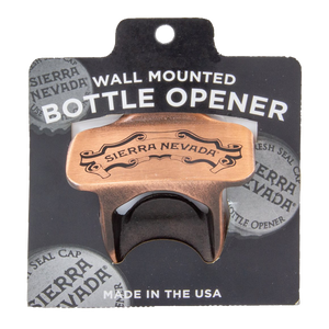 Thumbnail of A copper-colored wall-mounted bottle opener with 'Sierra Nevada' engraved on it, mounted on a black retail backing card with white text.