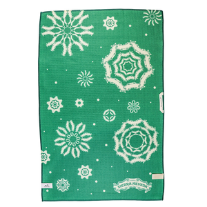 Thumbnail of Green towel with white snowflake patterns and Sierra Nevada logo on a white background
