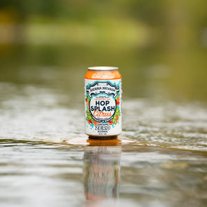 Thumbnail of Sierra Nevada Brewing Co. Hop Splash Citrus Non-Alcoholic Sparkling Hop Water - A can of refreshing Hop Splash Citrus sits on a flat stone surrounded by a gently moving river