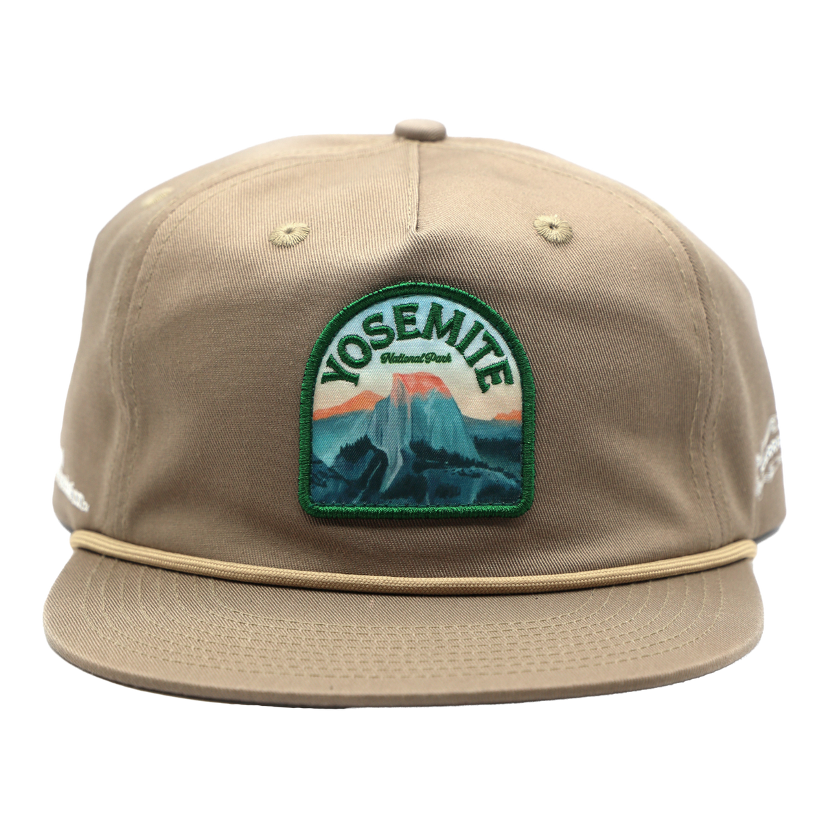 Beige cap with Yosemite National Park patch on a white background