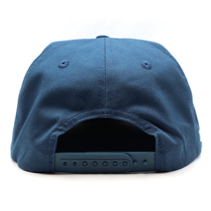 Thumbnail of Blue cap with a flat back on a white background