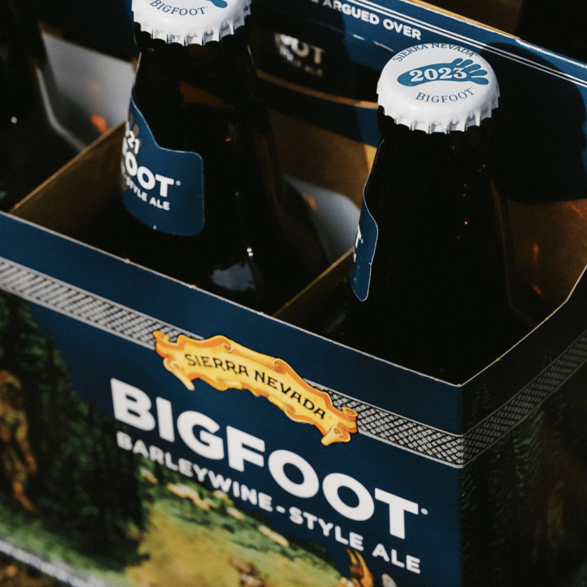 A closeup shot of Bigfoot bottle caps inside a 6-pack