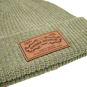 Thumbnail of Green textured fabric with a Sierra Nevada leather label on a white background