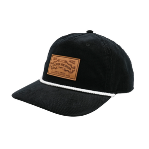 Thumbnail of A black corduroy baseball cap with a brown leather patch on the front and a white rope detail across the brim, shown on a plain white background.