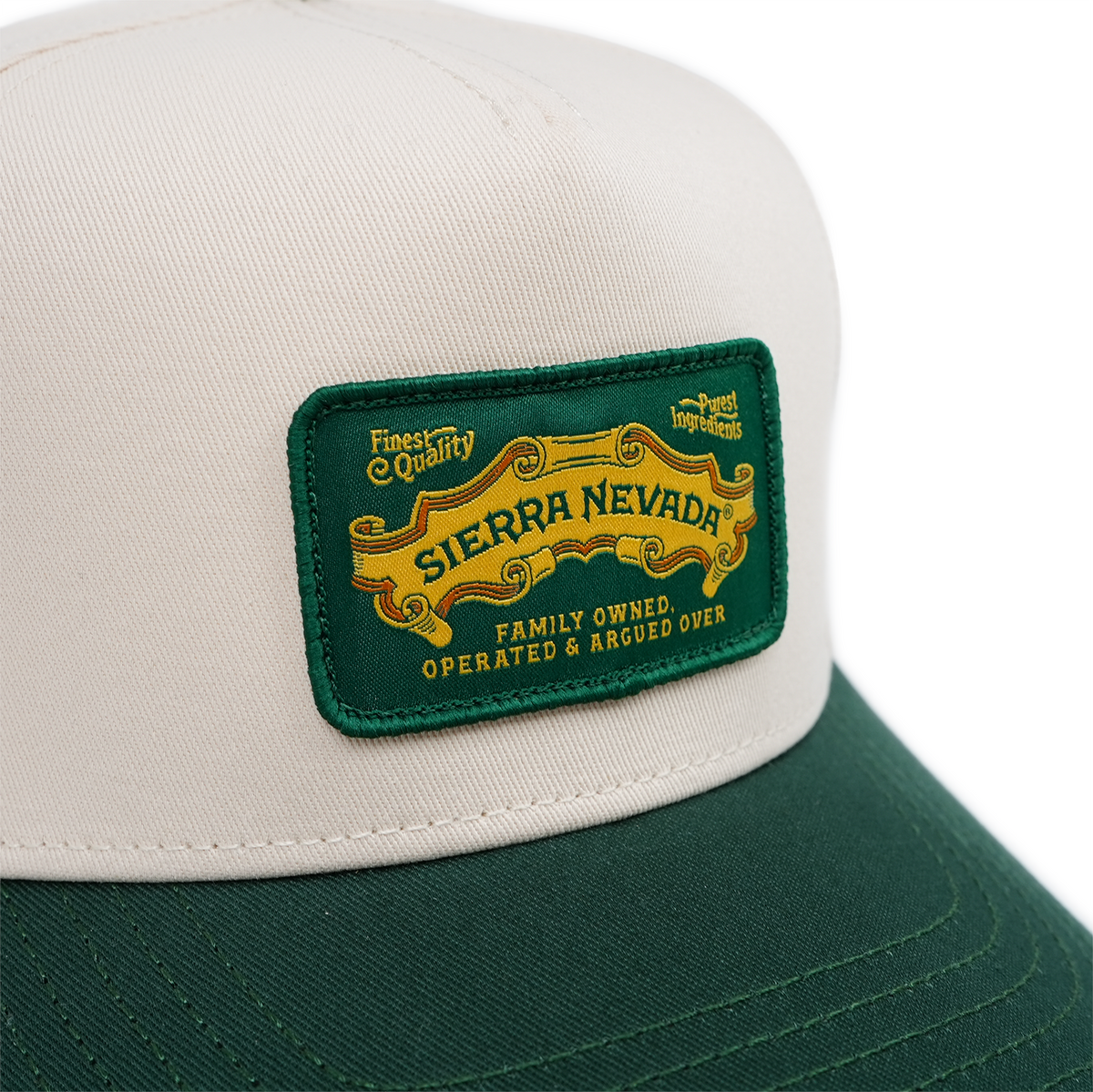 Green and beige cap with Sierra Nevada logo on a white background