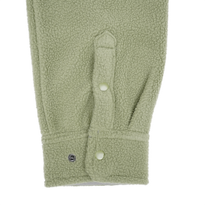 Thumbnail of Close-up of a green fleece jacket with button details on a white background