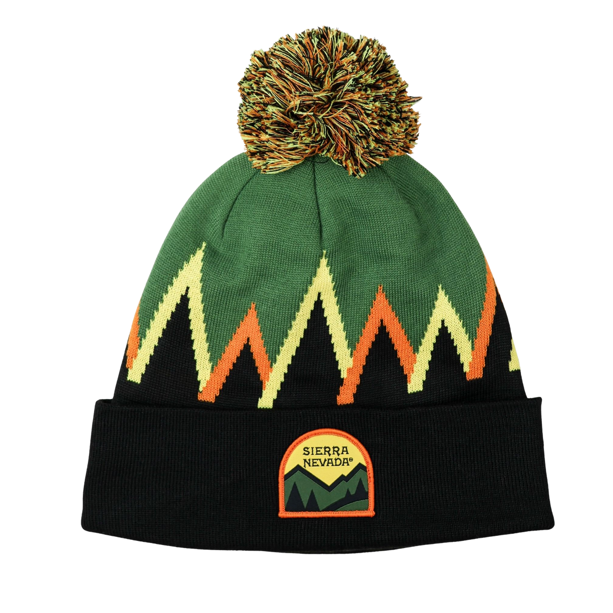 Green beanie with orange and yellow patterns and a pom-pom on a white background