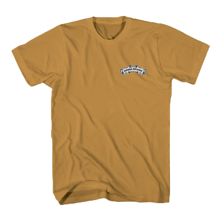 A mustard yellow short-sleeve t-shirt with a small white and black graphic on the left chest, displayed flat against a white background.
