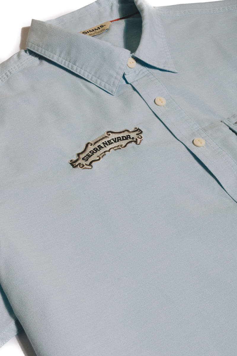 Sierra Nevada Brewing Co. X Simms Cutbank Chambray Short Sleeve Shirt - detail view of embroidered Sierra Nevada logo on chest