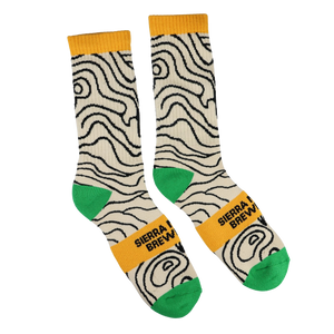 Thumbnail of Pair of socks with a unique pattern and color scheme on a white background