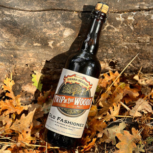 Thumbnail of Sierra Nevada Brewing Co. Trip In The Woods Old Fashioned 750 mL bottle in a fall setting with colorful leaves