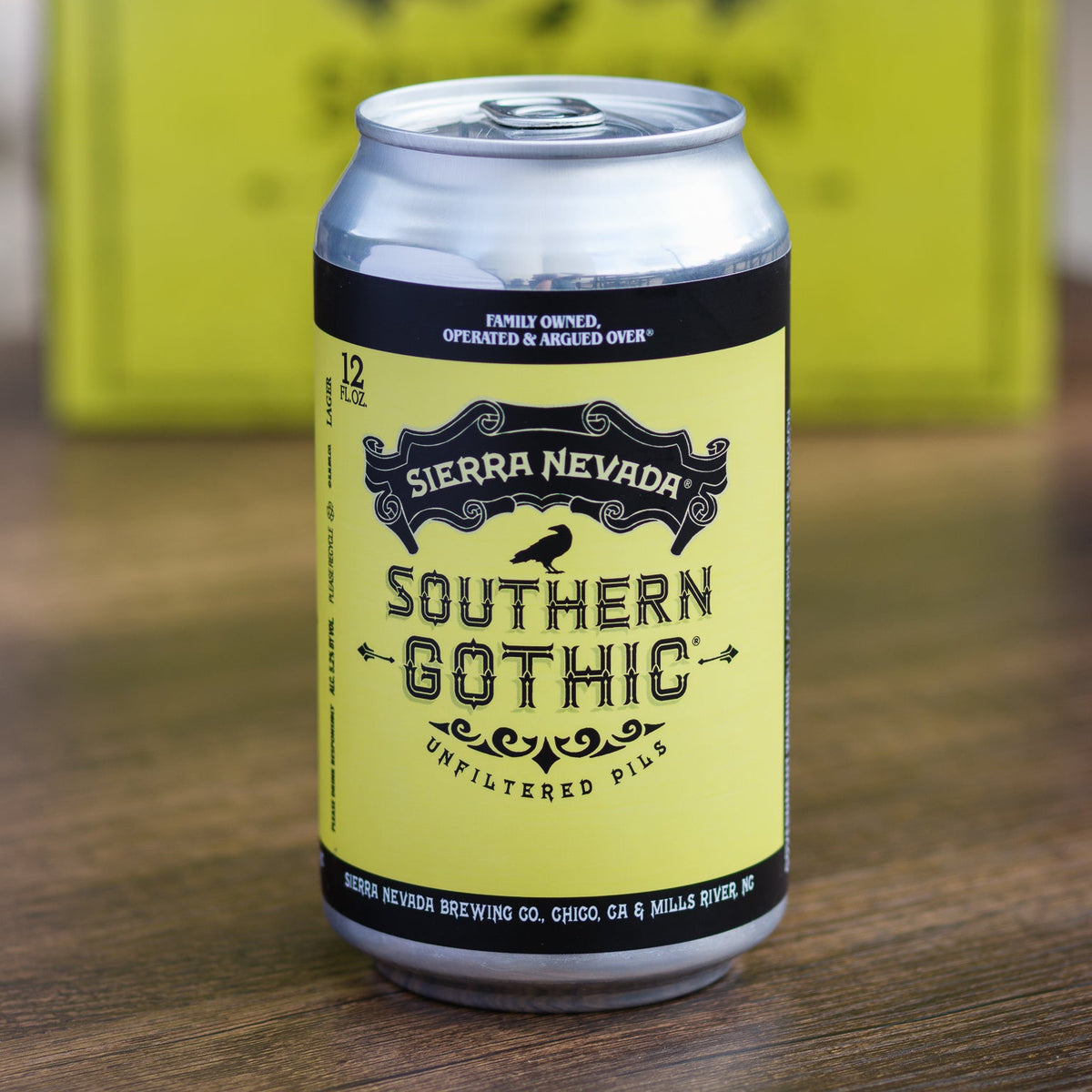 Sierra Nevada Southern Gothic beer can on a wooden surface with a box in the background