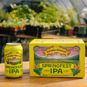Thumbnail of Sierra Nevada Springfest IPA can and six-pack on a wooden surface with plants in the background