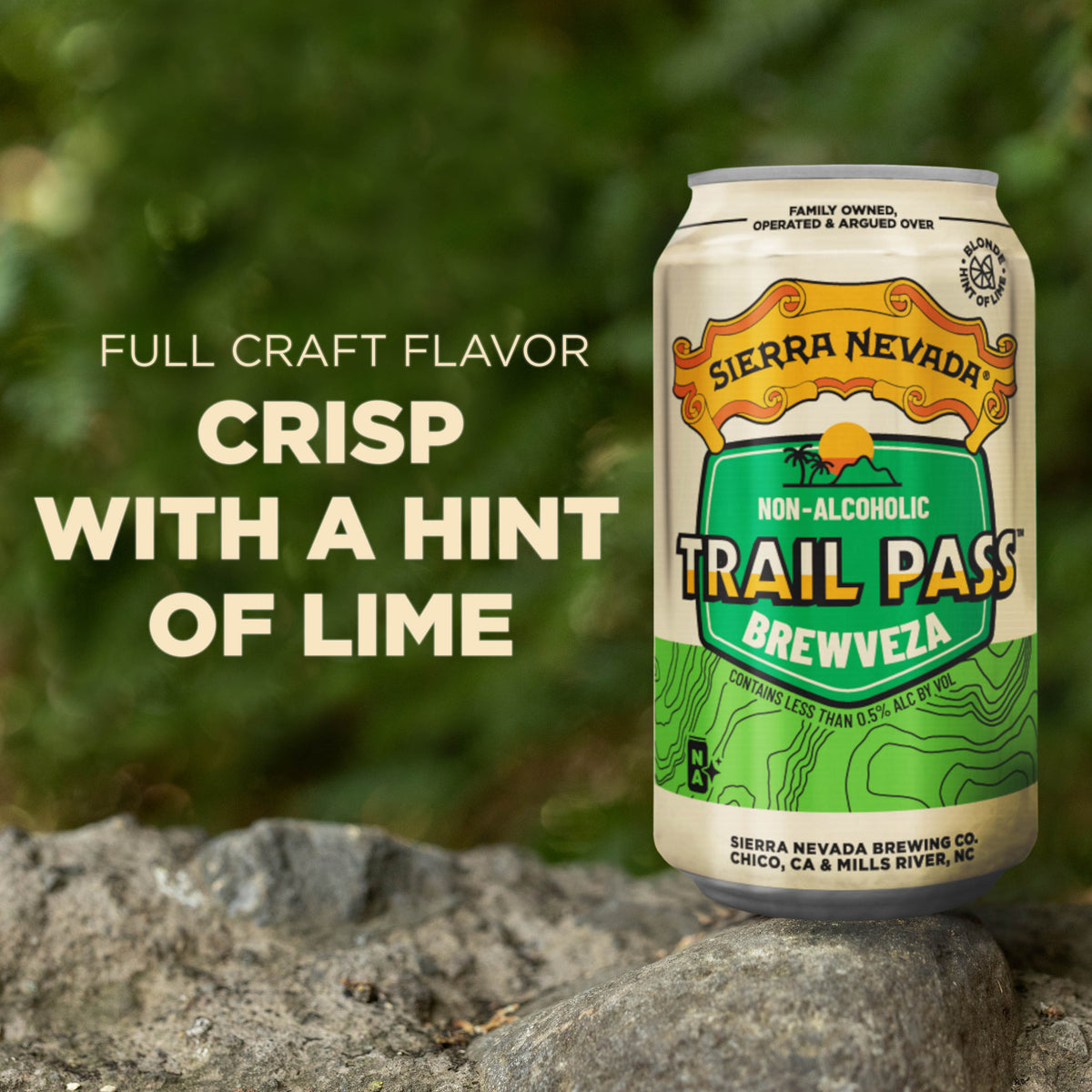 Sierra Nevada Trail Pass Brewveza non-alcoholic beer can on a rock with greenery in the background